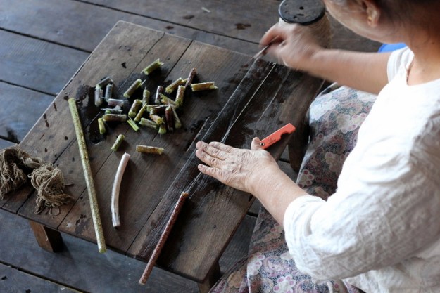 Creating string/yarn (to ultimately be used on a loom) out of the stem of a lotus flower.  This was my favorite thing to watch/learn this day.